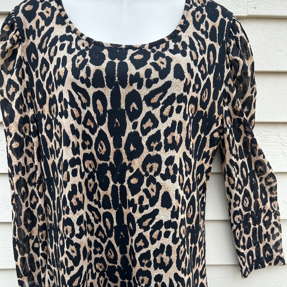 INC stretch nylon animal print top with scoop neck and 3/4 puff sleeves. Size XL